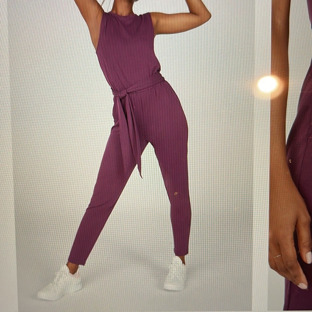NWT Fabletics Carli Jumpsuit size Large Gorgeous Magenta/Dark Eggplant color